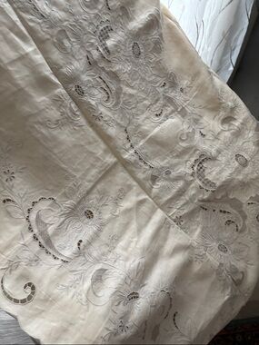 Handmade tablecloth and two napkins—new.